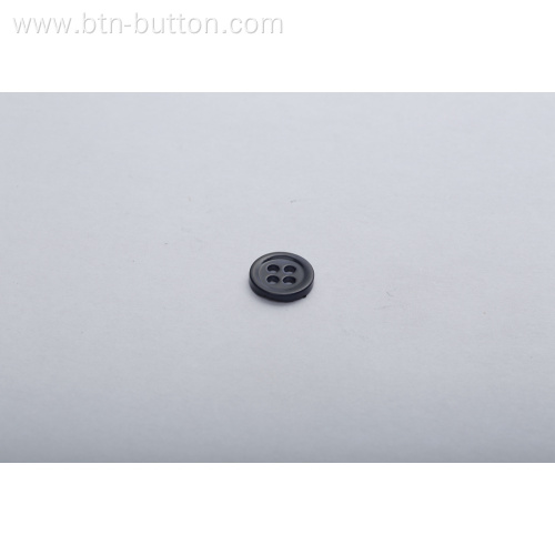 Shell buttons are used in knitted sweaters